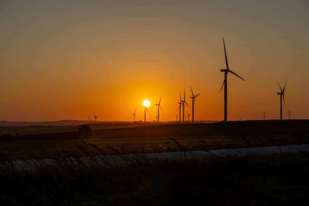 pexels-photo-18314438-18314438 Beautiful sunset over a wind farm in Silivri, İstanbul, showcasing sustainable energy efforts.