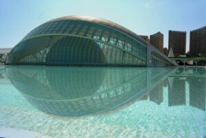 Stunning architecture at Valencia's City of Arts and Sciences, reflecting in crystal-clear water.