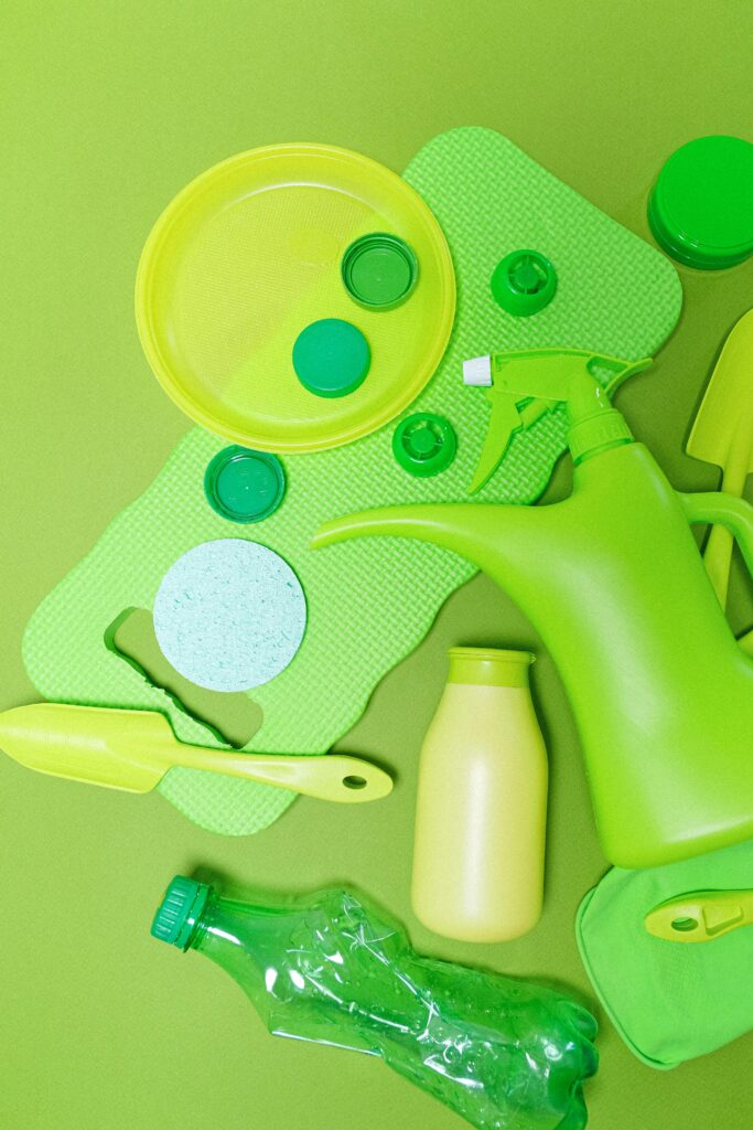 pexels-photo-5217777-5217777 Top view of assorted green plastic kitchen items on a matching background.